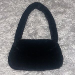 Black fuzzy bag